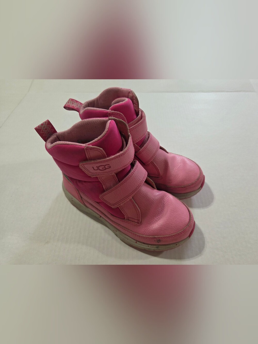 UGG Kids Dannie Weather Waterproof Boot in the "Sachet Pink/Berry" colorway'
